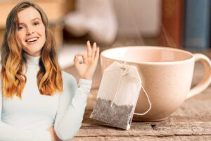 bustina tè tazza donna gesto ok